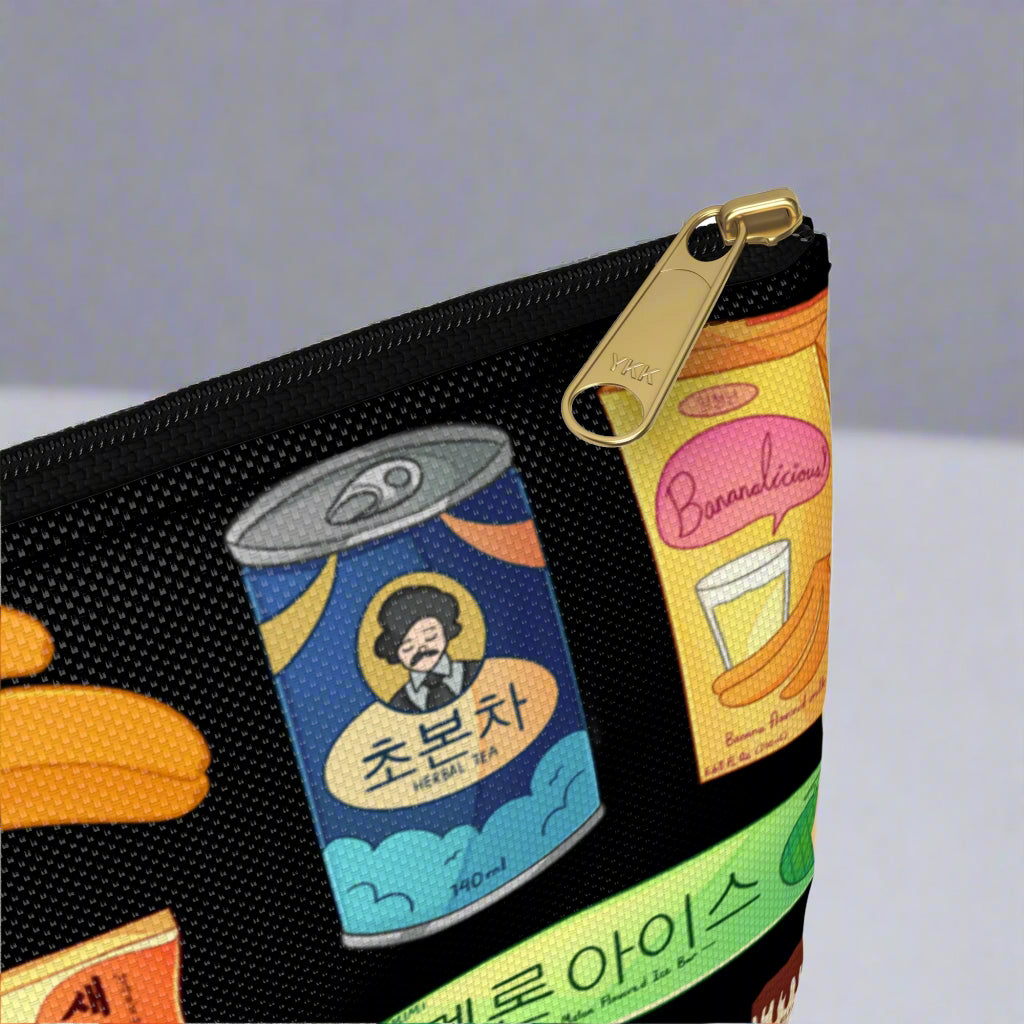Pouch with colorful Korean snacks on a black background