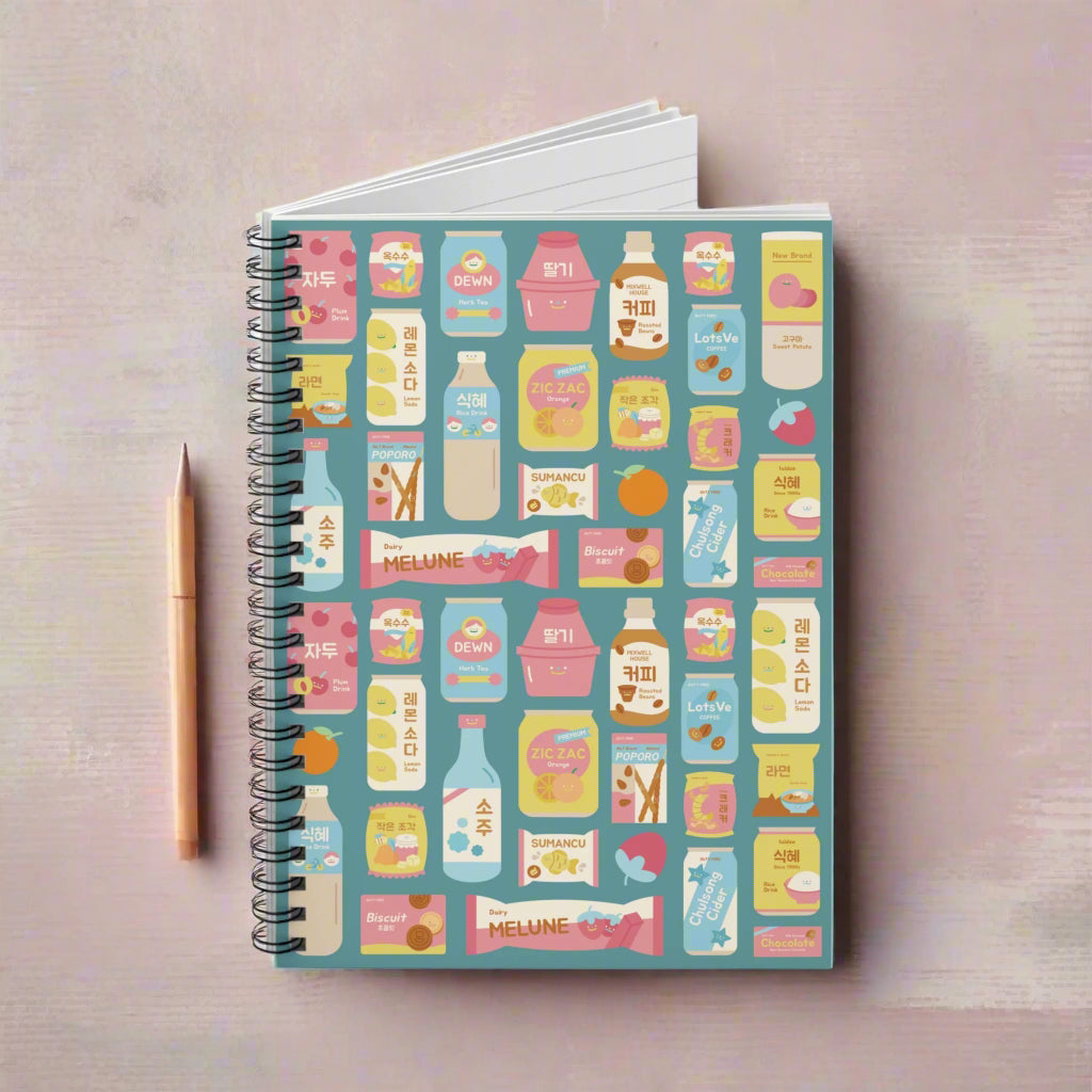 Notebook with product packaging design on a blue background