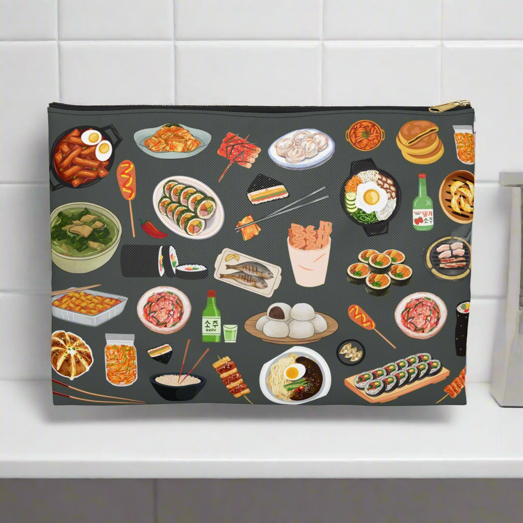Pouch with illustrations of various Korean dishes on a dark background