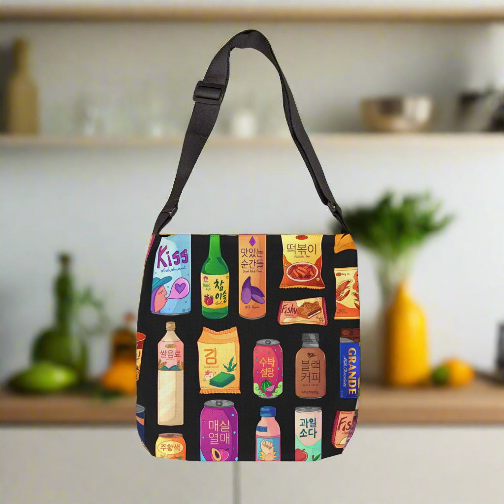 Crossbody bag with colorful drink and food packaging design on a white background