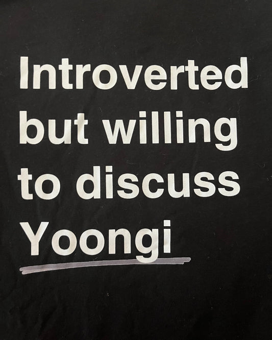 Black shirt with white text 'Introverted but willing to discuss Yoongi' on a black background