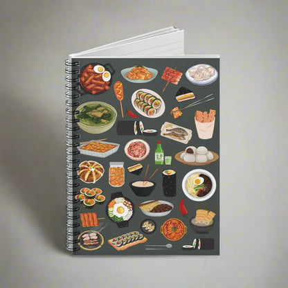 Notebook with illustrations of various foods on a dark background