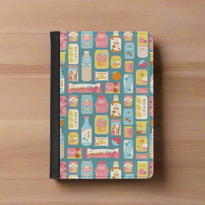 Passport wallet with colorful product pattern on a blue background