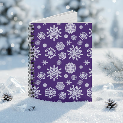 Notebook with white snowflake pattern on a purple cover