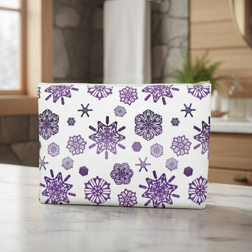 Rectangular pouch with purple snowflake pattern on a white background