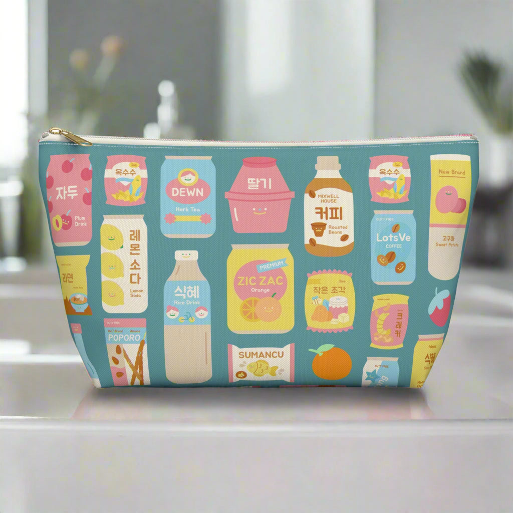 Pouch with cute pastel Korean snack illustrations on a blue background
