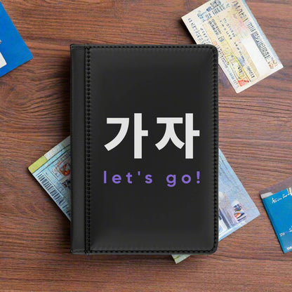 Black notebook cover with Korean text '가자' and 'let's go!' on a black background