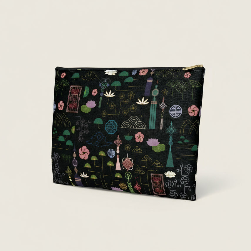 Pouch with a colorful geometric pattern on a black background