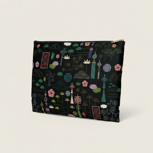 Pouch with a colorful geometric pattern on a black background