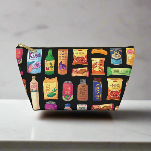 Pouch with colorful Korean snacks design on a white background