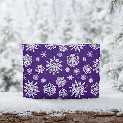 Purple pouch with white snowflake pattern on a white background