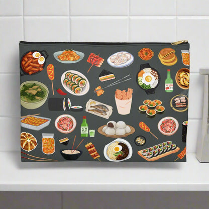 Pouch with illustrations of various Korean dishes on a dark background