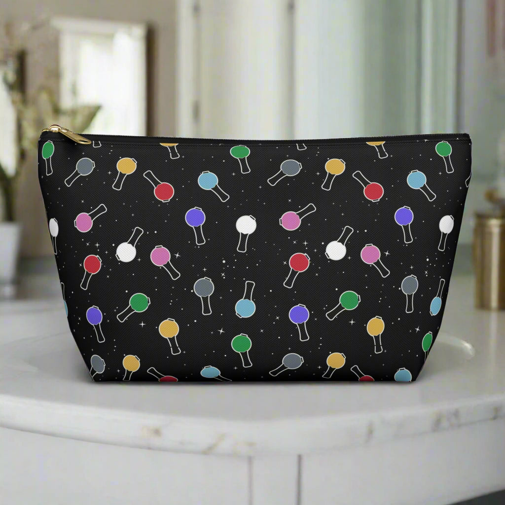 Black pouch with colorful pattern on a white background