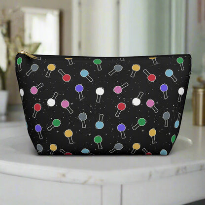 Black pouch with colorful pattern on a white background