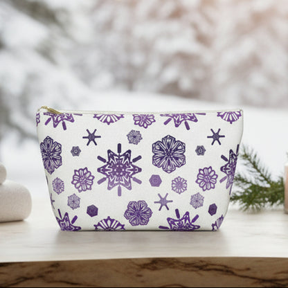 Pouch with purple geometric pattern on a white background