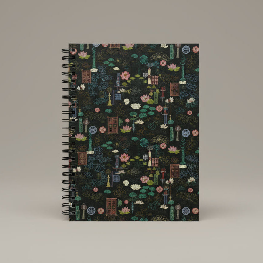 Notebook with a colorful geometric pattern on a black background