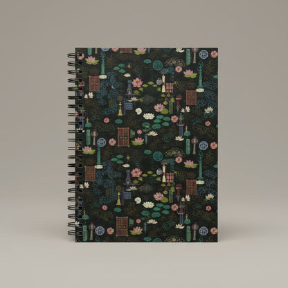 Notebook with a colorful geometric pattern on a black background