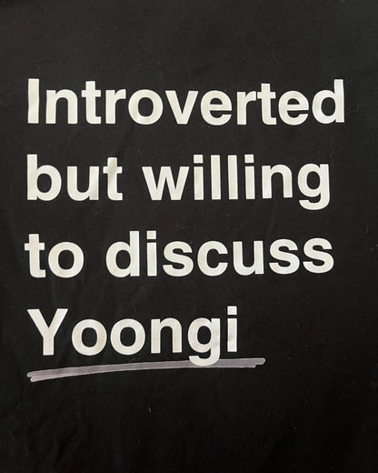 Black shirt with white text 'Introverted but willing to discuss Yoongi' on a black background